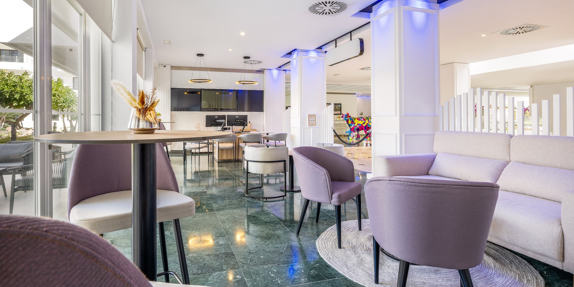 a room with chairs and tables