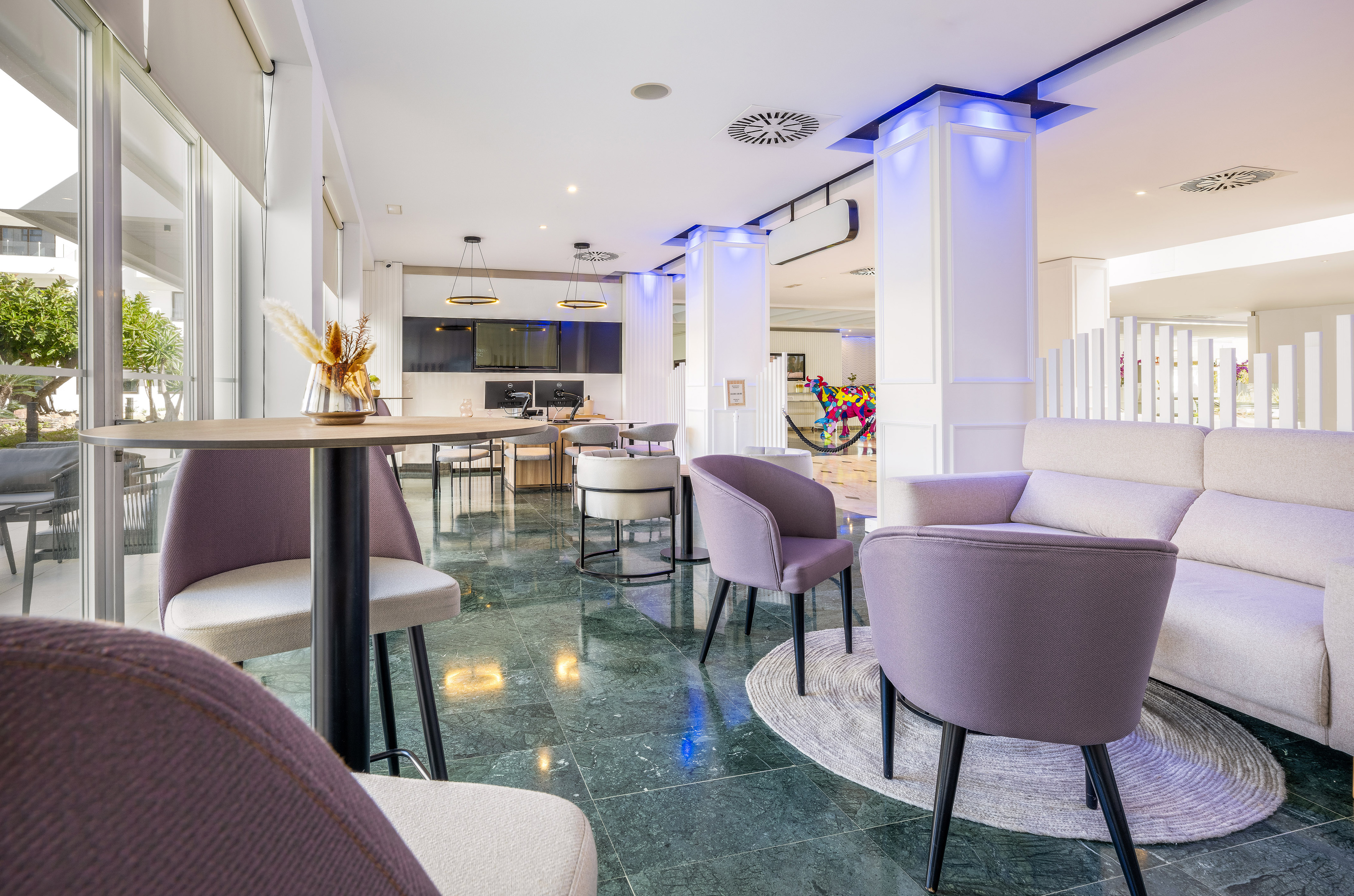 a room with chairs and tables