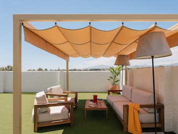 a patio with a covered patio area