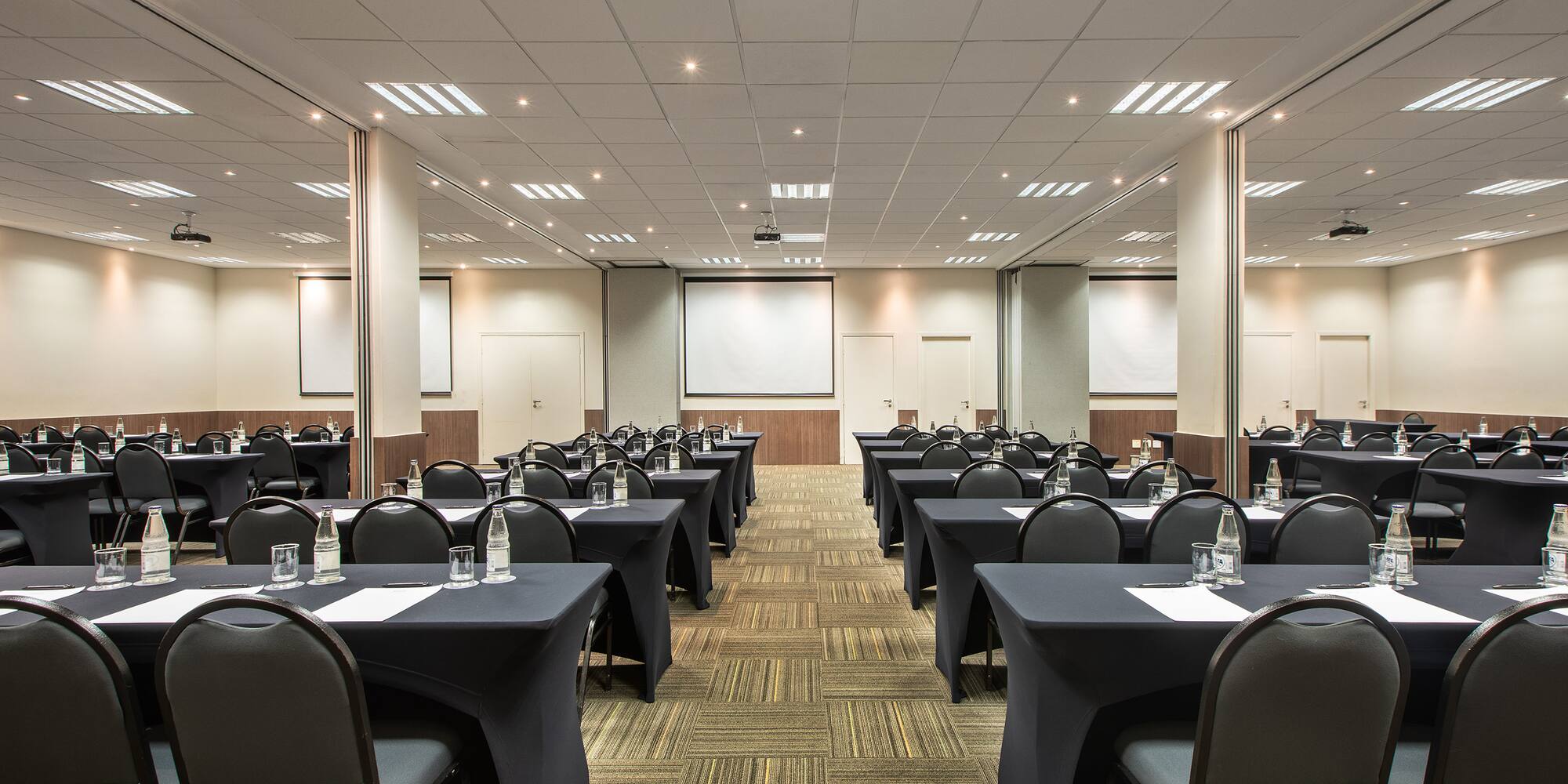 a room with tables and chairs