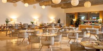 a room with tables and chairs