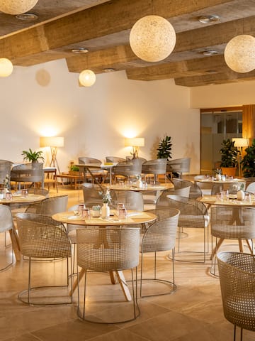 a room with tables and chairs