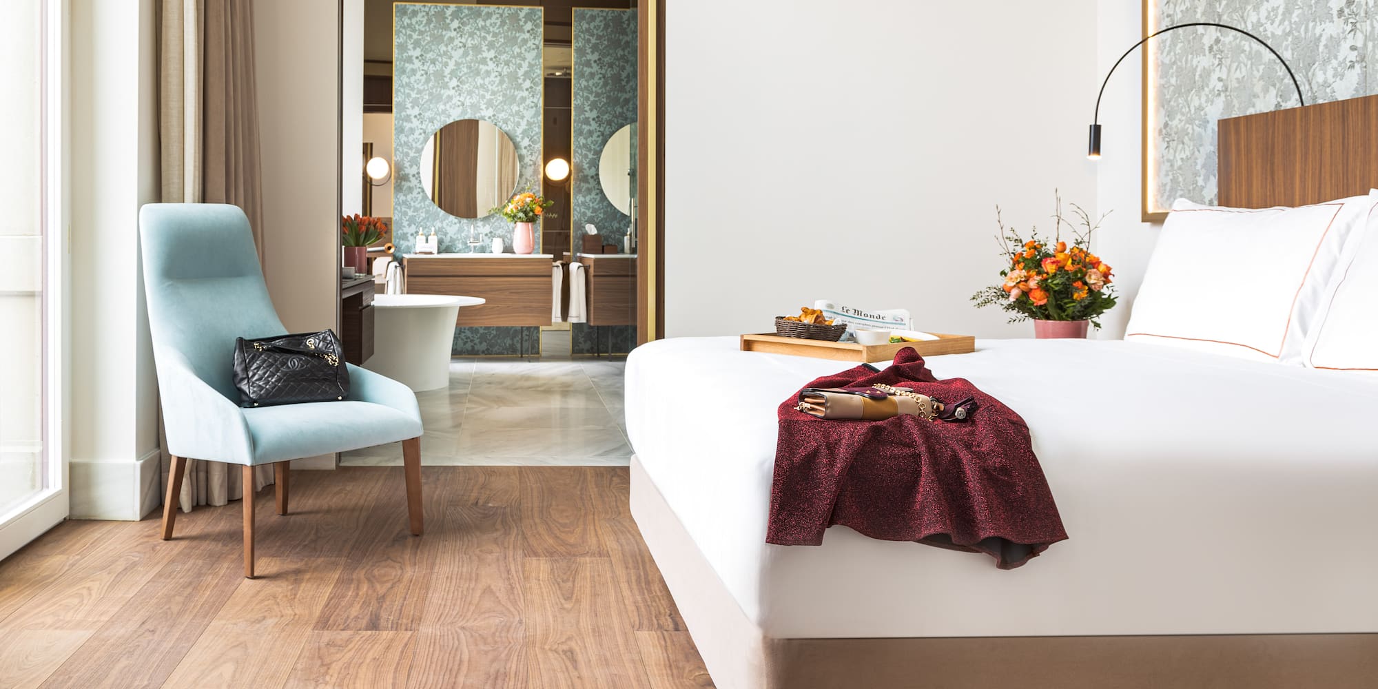 a room with a bed and chair