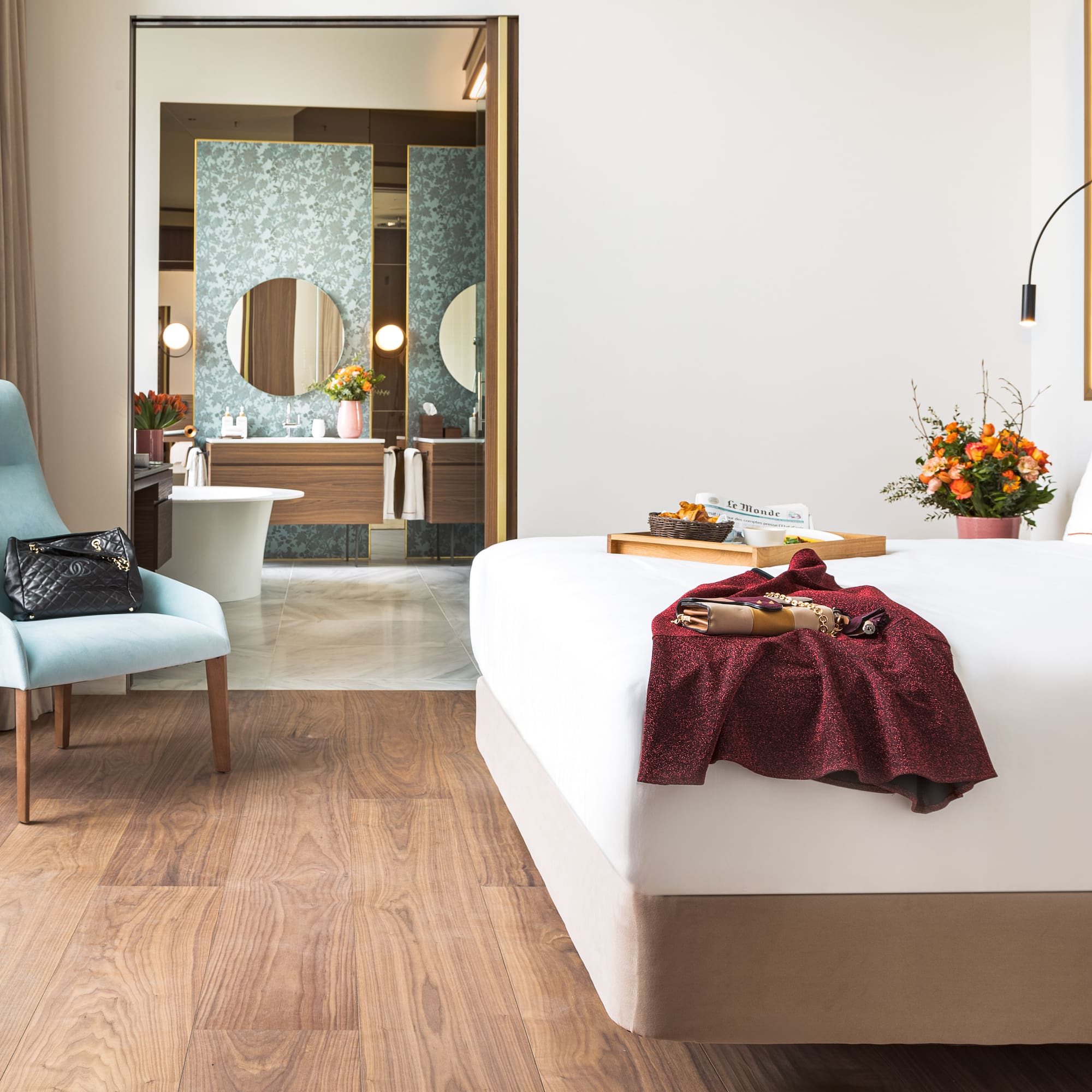 a room with a bed and chair