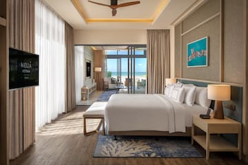a room with a bed and a window