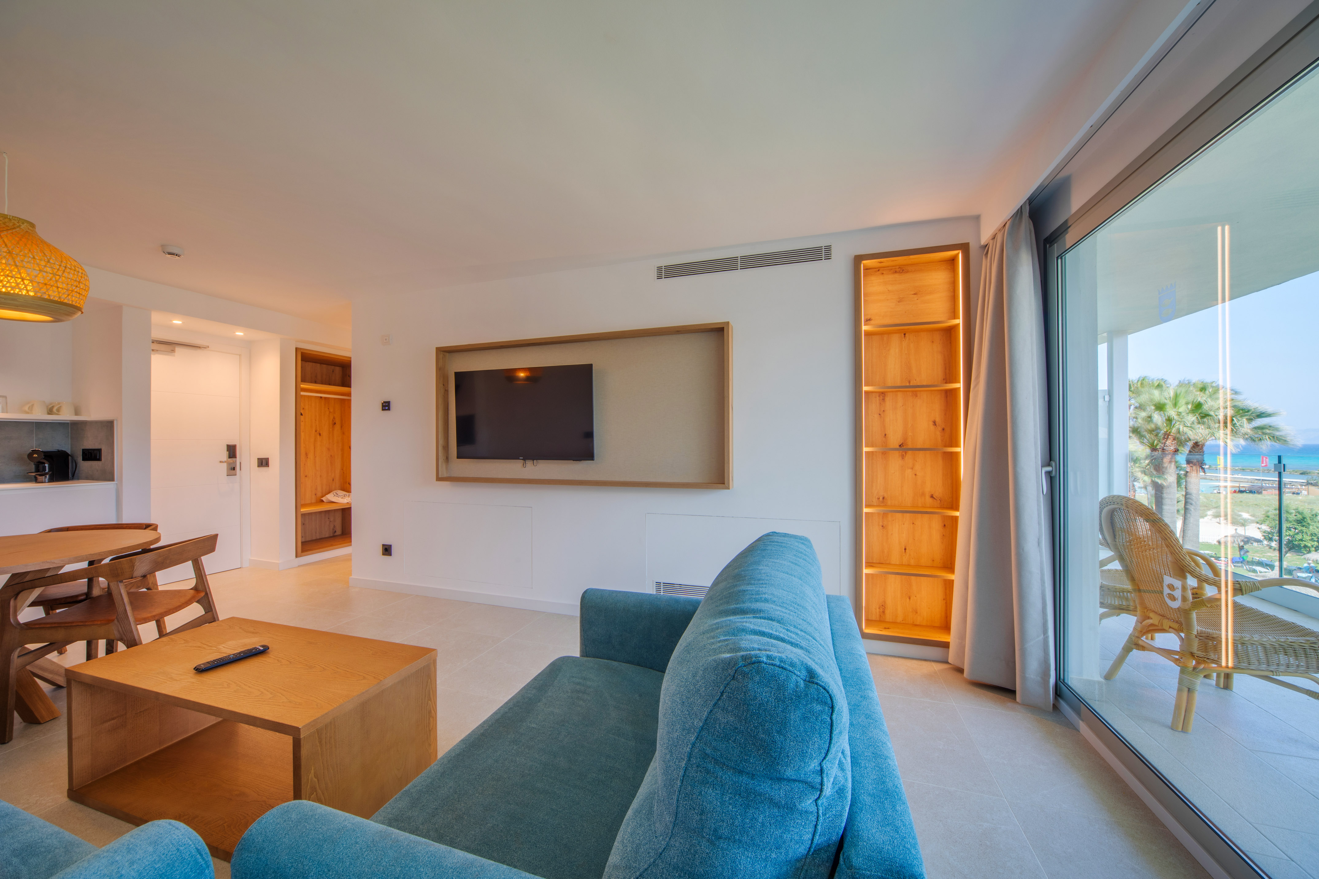 a living room with a couch and a tv