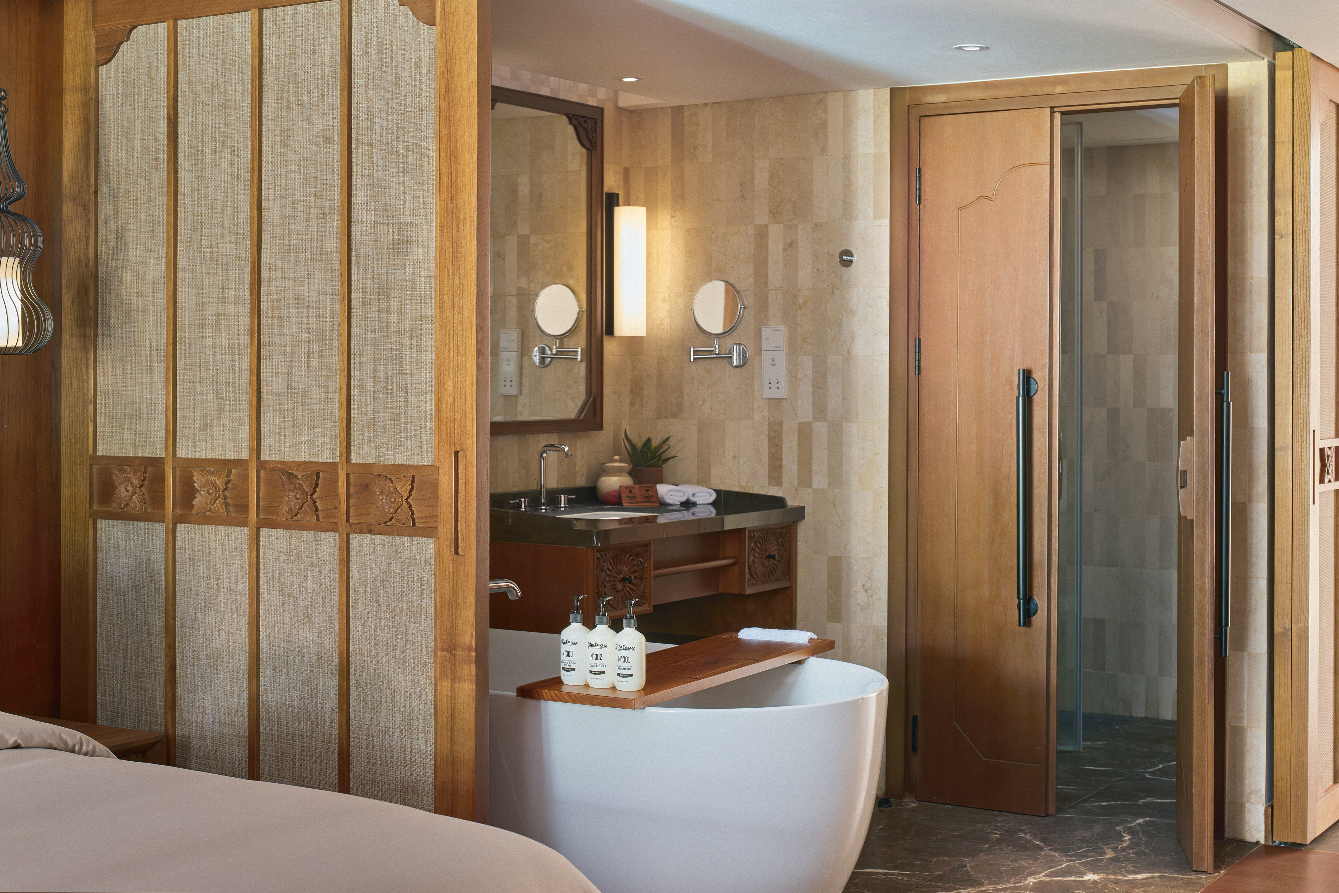 a bathroom with a bathtub and a shower