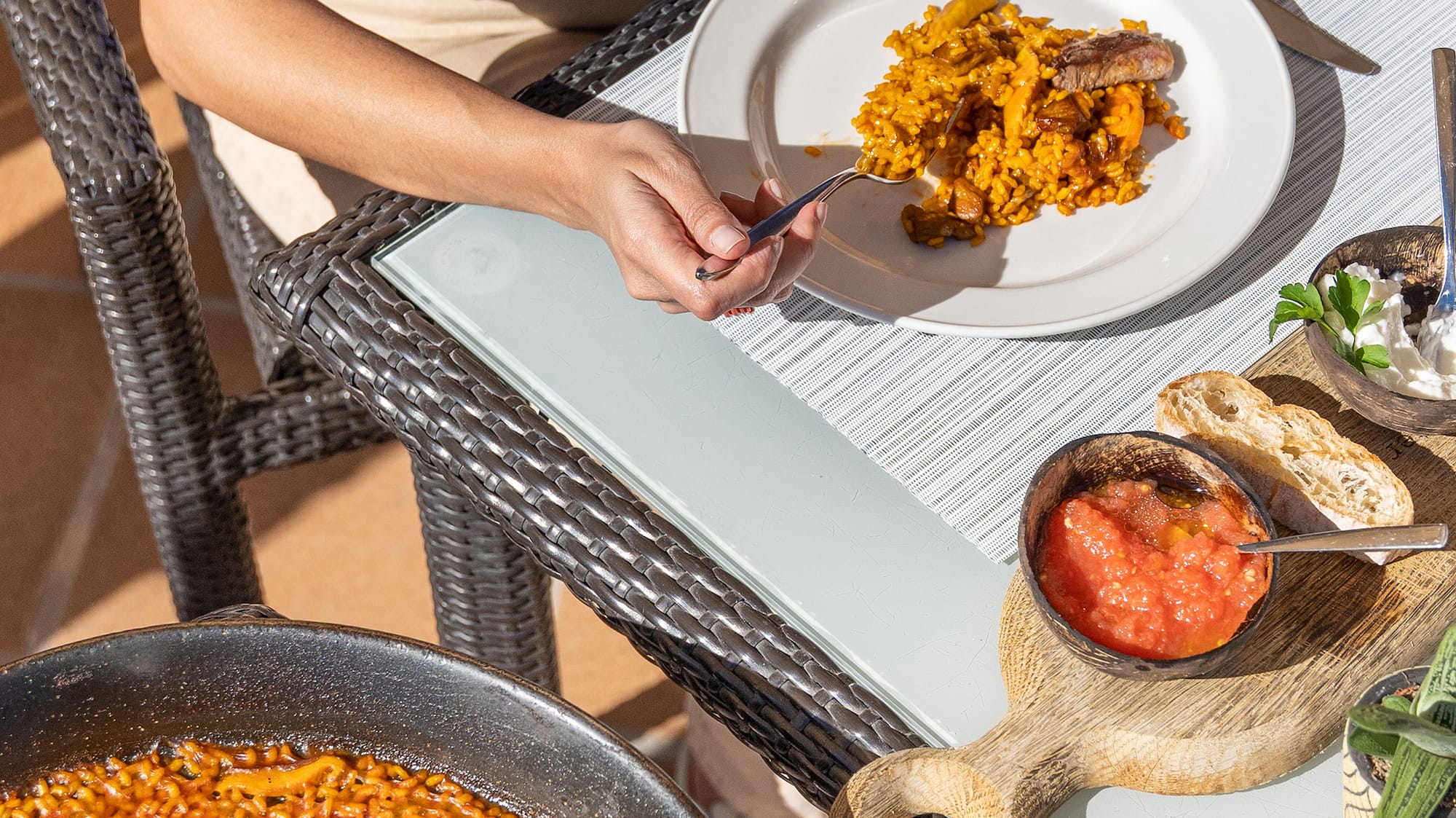 a person eating food on a table