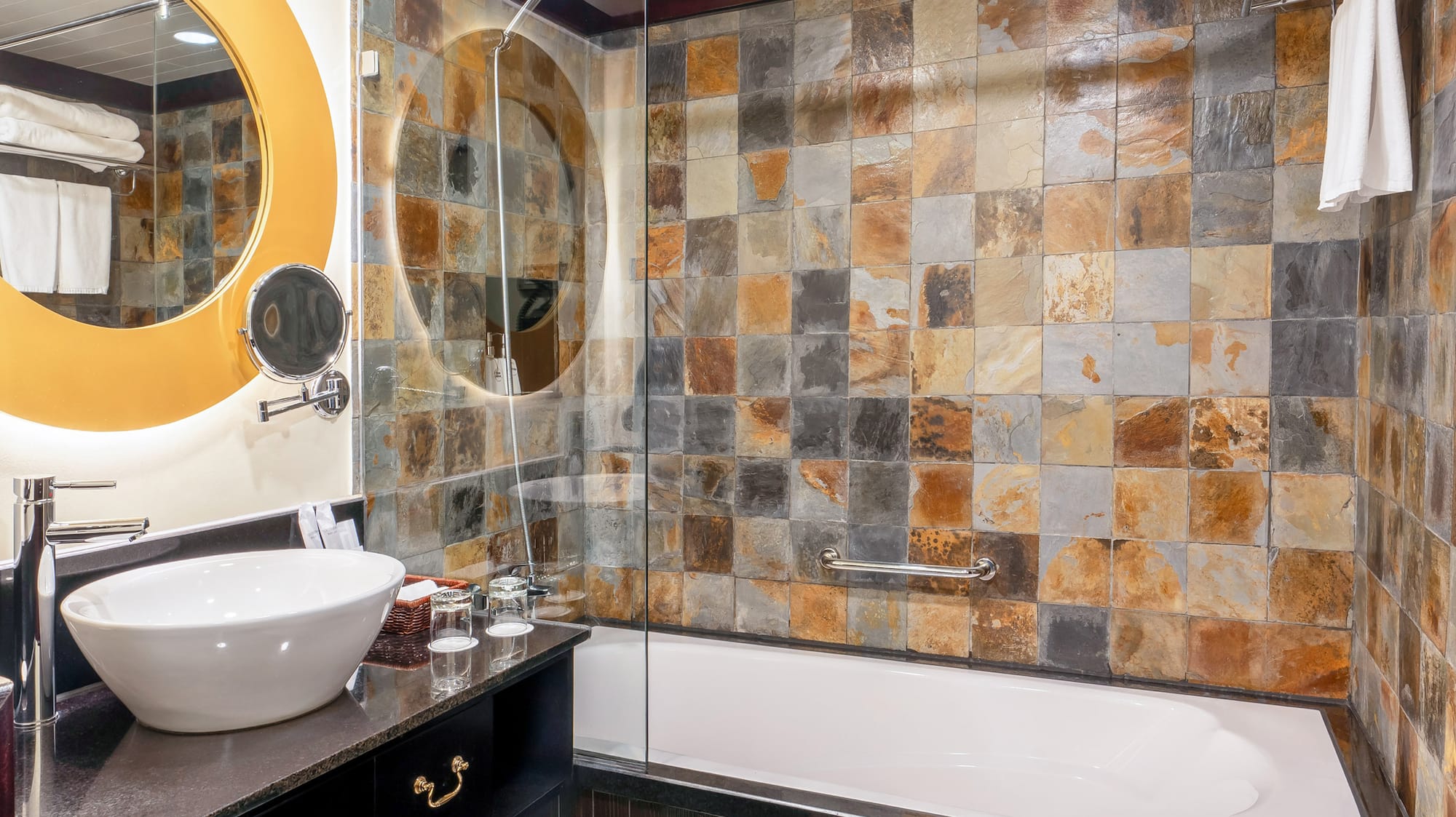 a bathroom with a sink and a shower