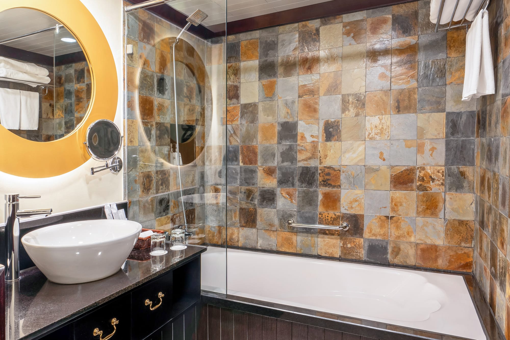 a bathroom with a sink and a shower