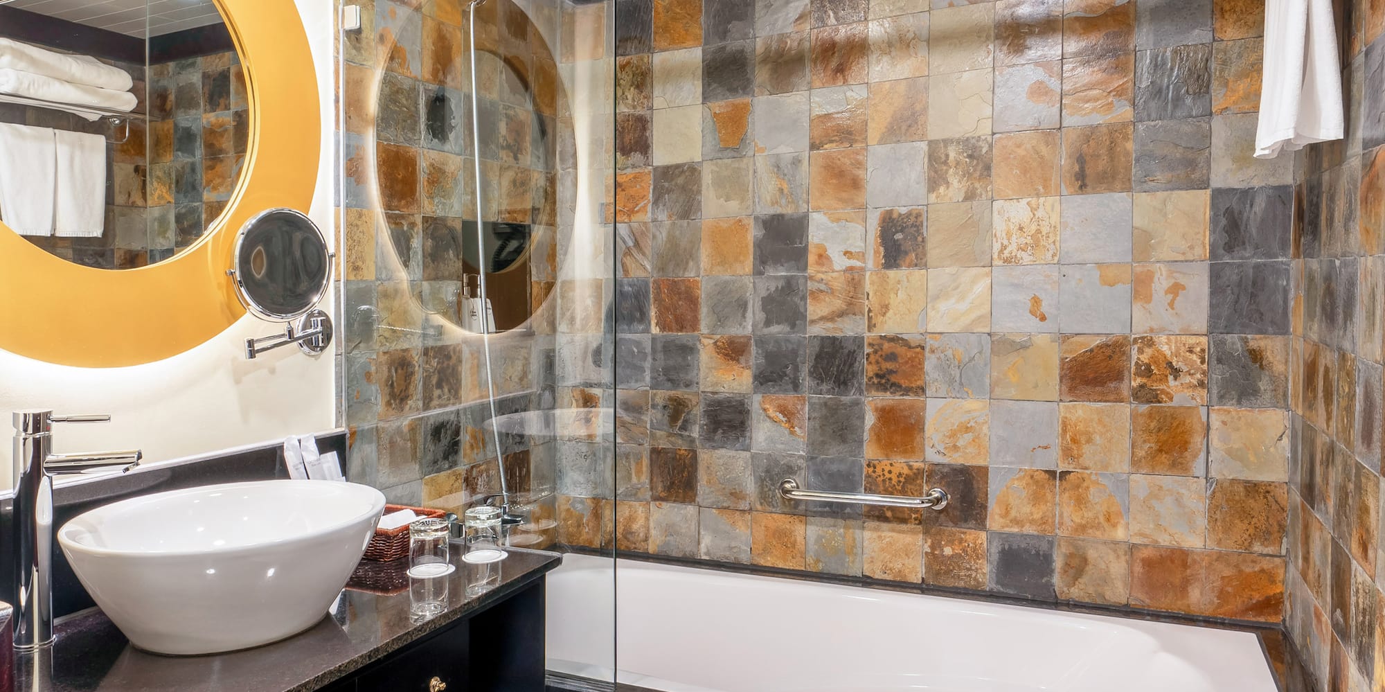 a bathroom with a sink and a shower