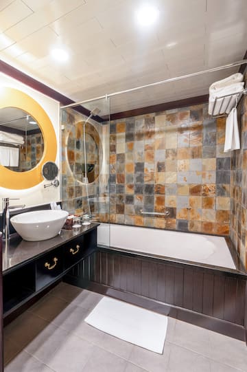a bathroom with a sink and a shower