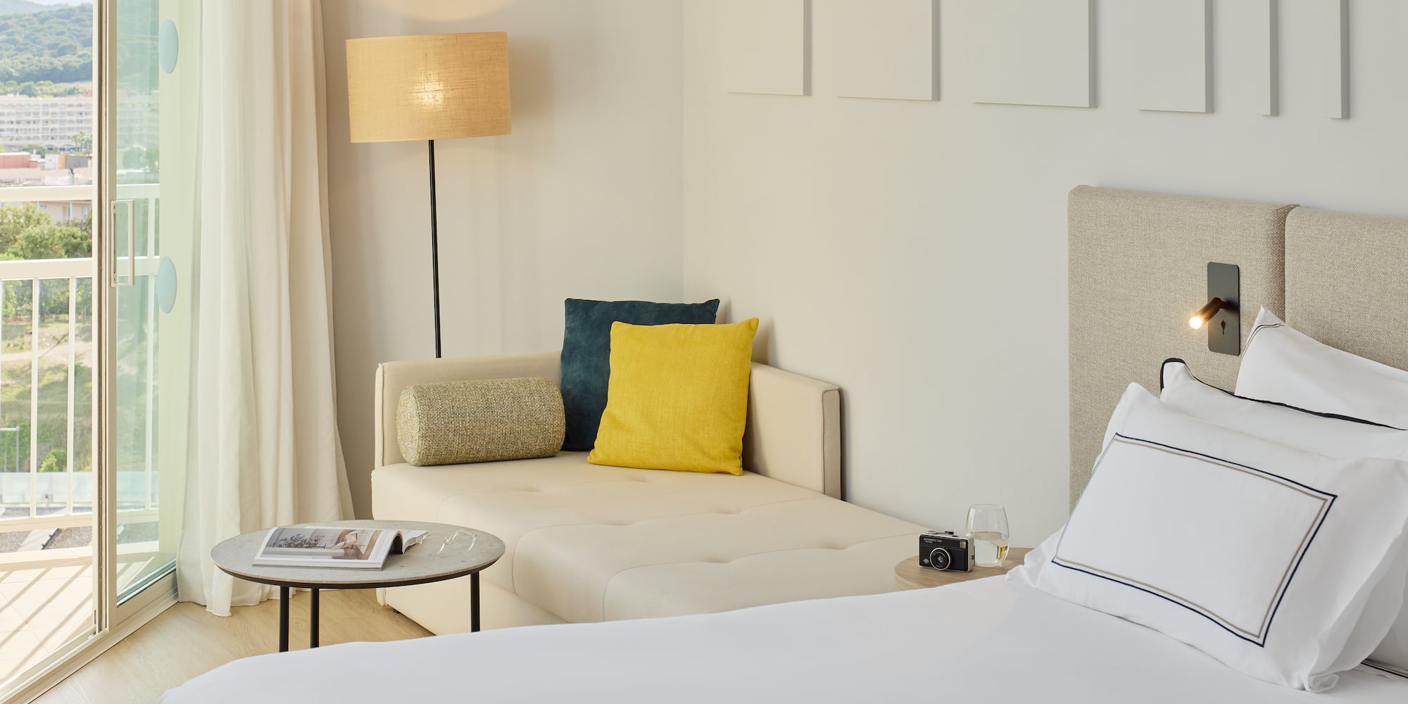 a bed and couch in a room