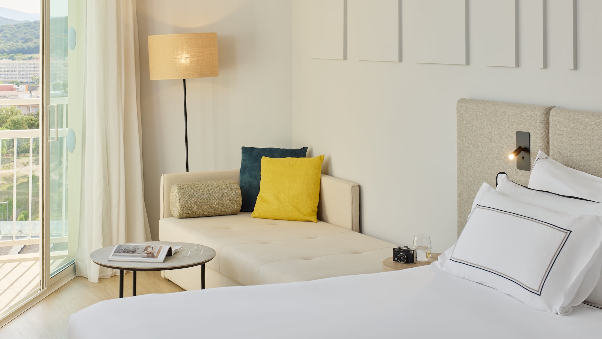 a bed and couch in a room