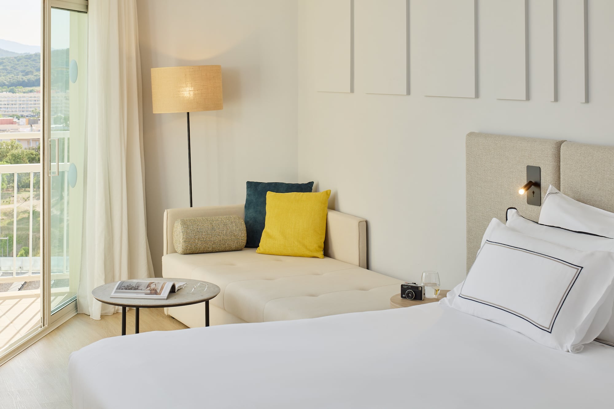 a bed and couch in a room