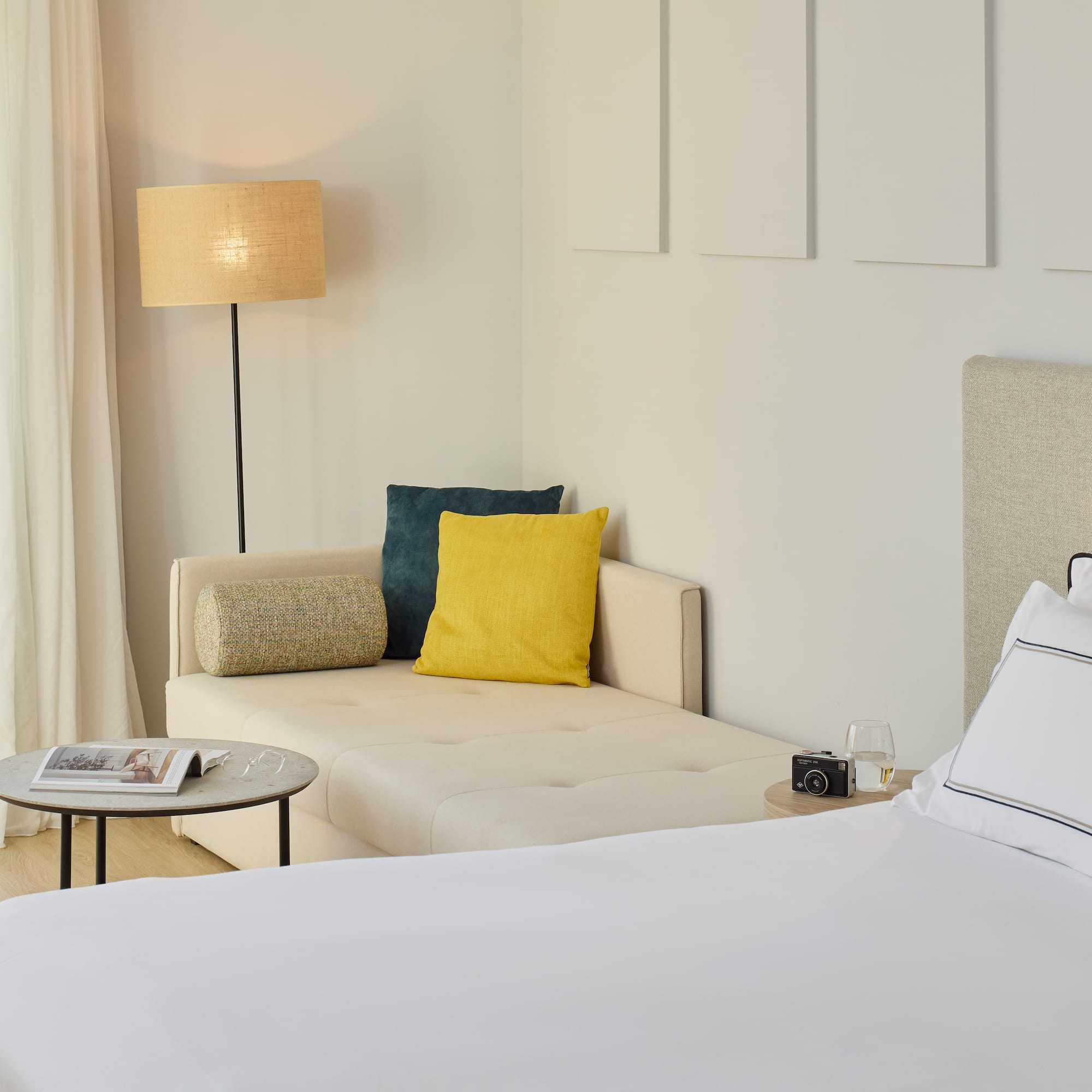 a bed and couch in a room