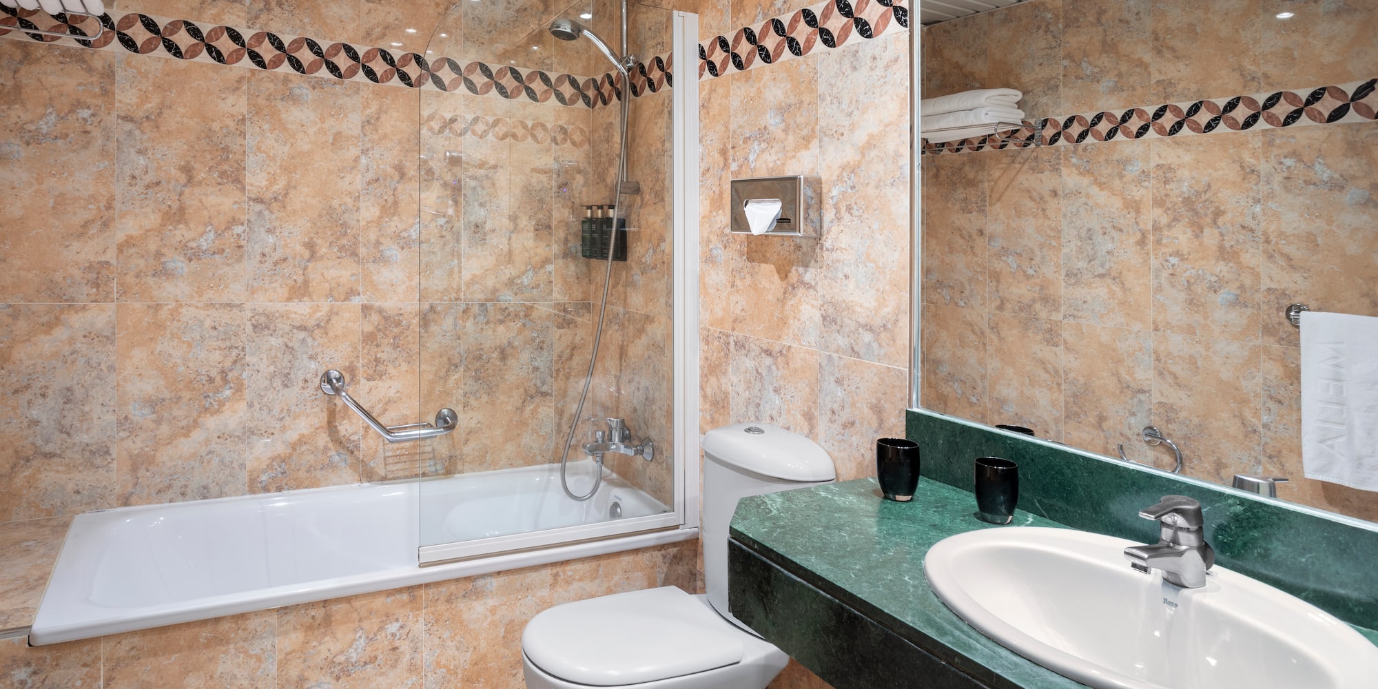a bathroom with a sink and toilet