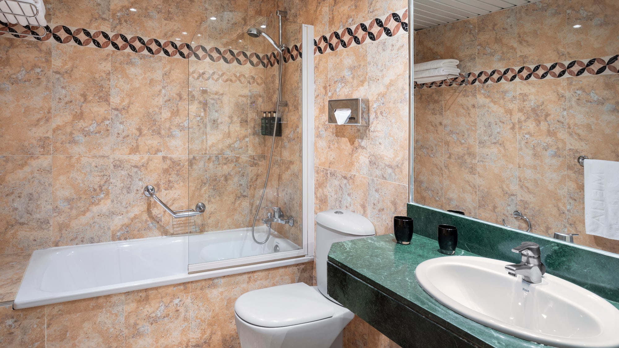 a bathroom with a sink and toilet