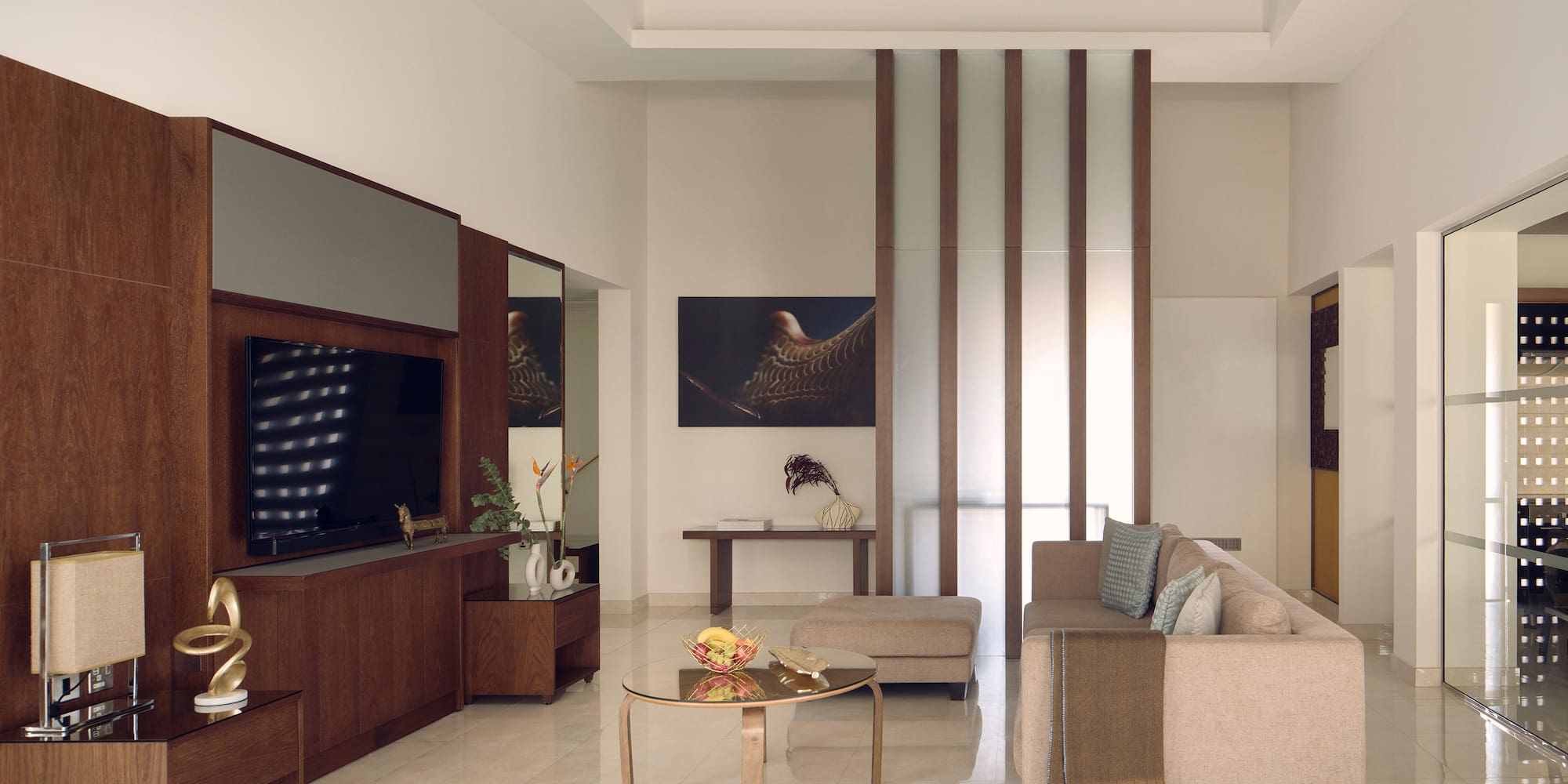 a living room with a couch and a tv