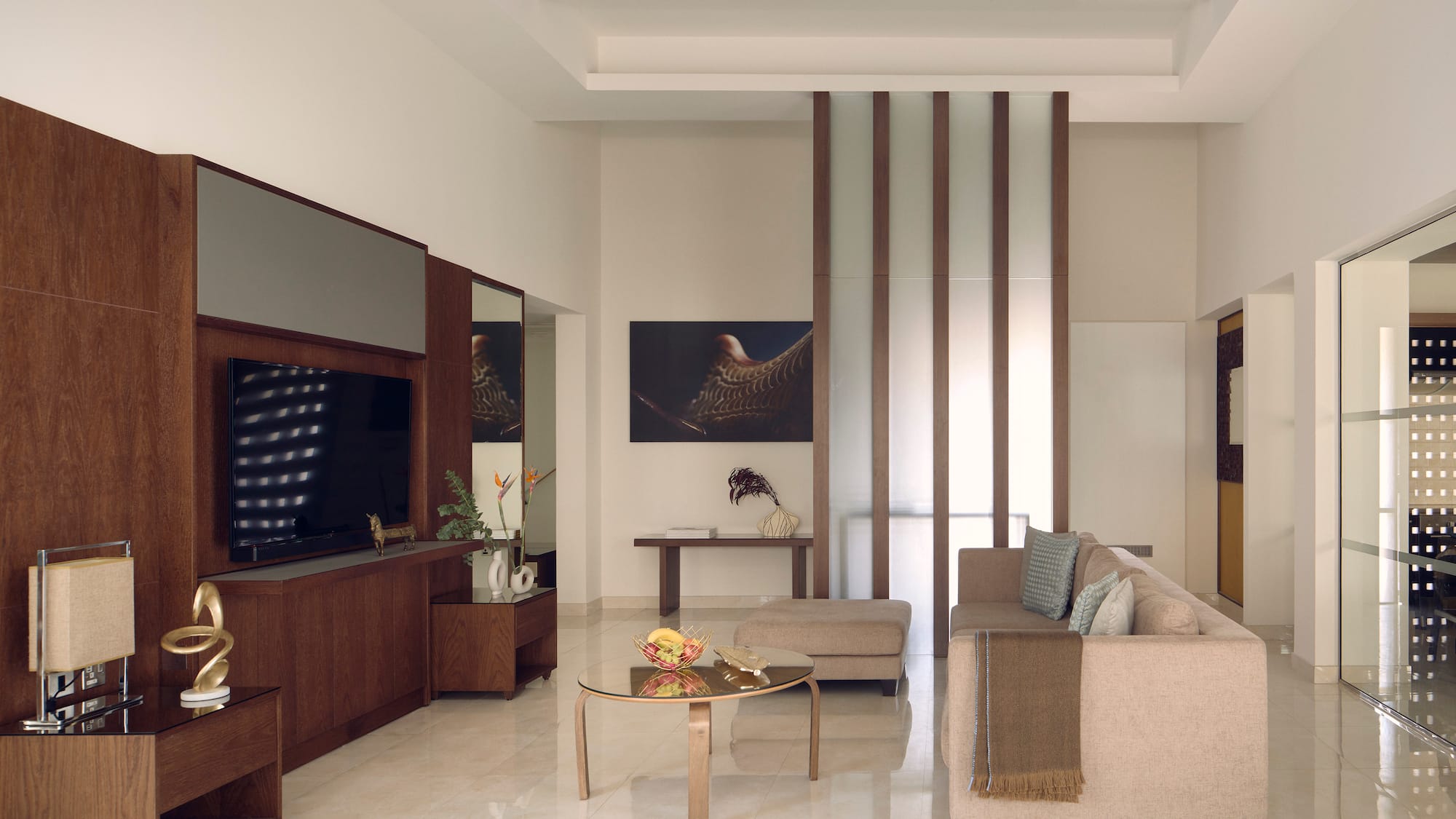 a living room with a couch and a tv