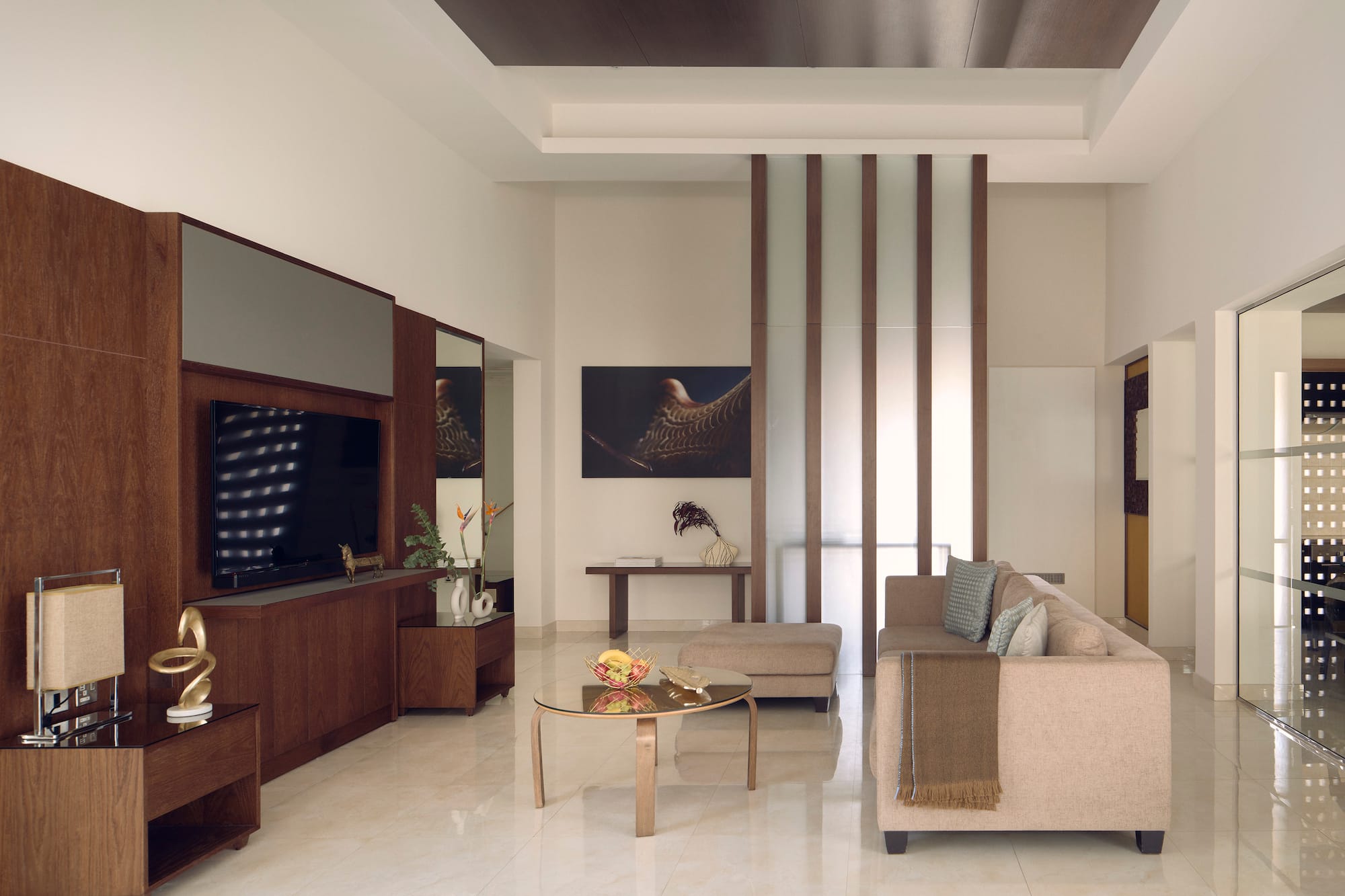 a living room with a couch and a tv