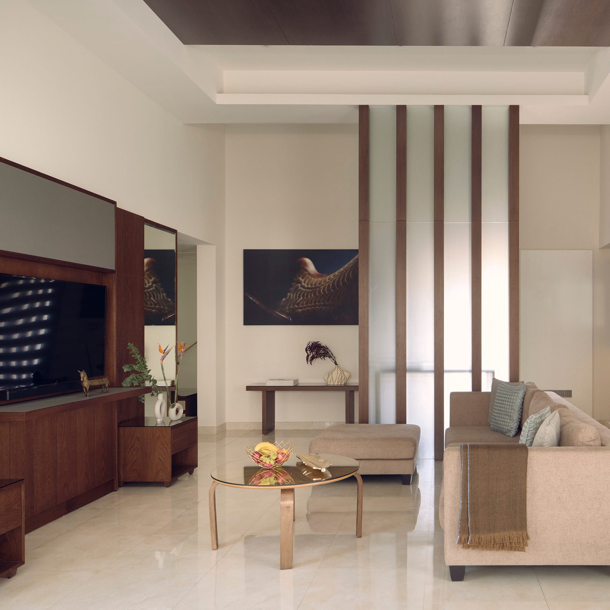 a living room with a couch and a tv