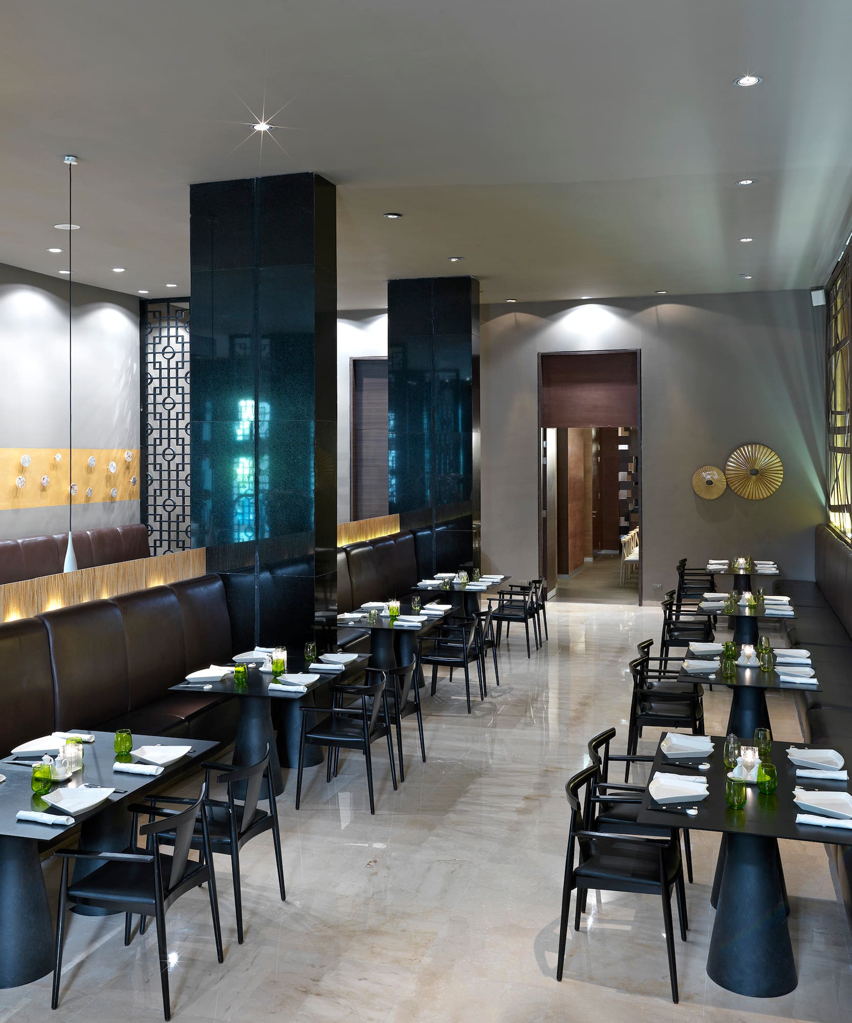 a restaurant with tables and chairs