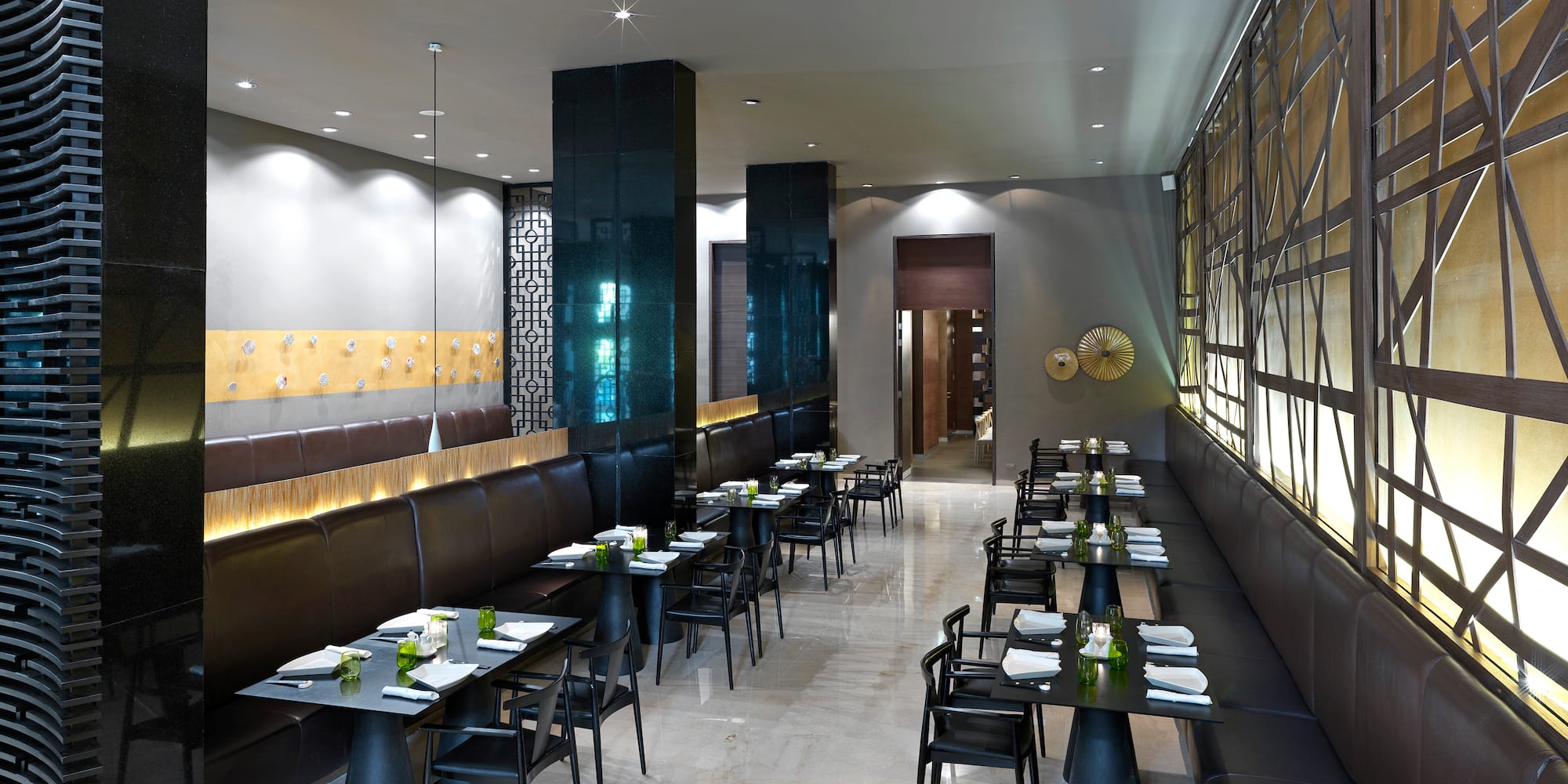 a restaurant with tables and chairs