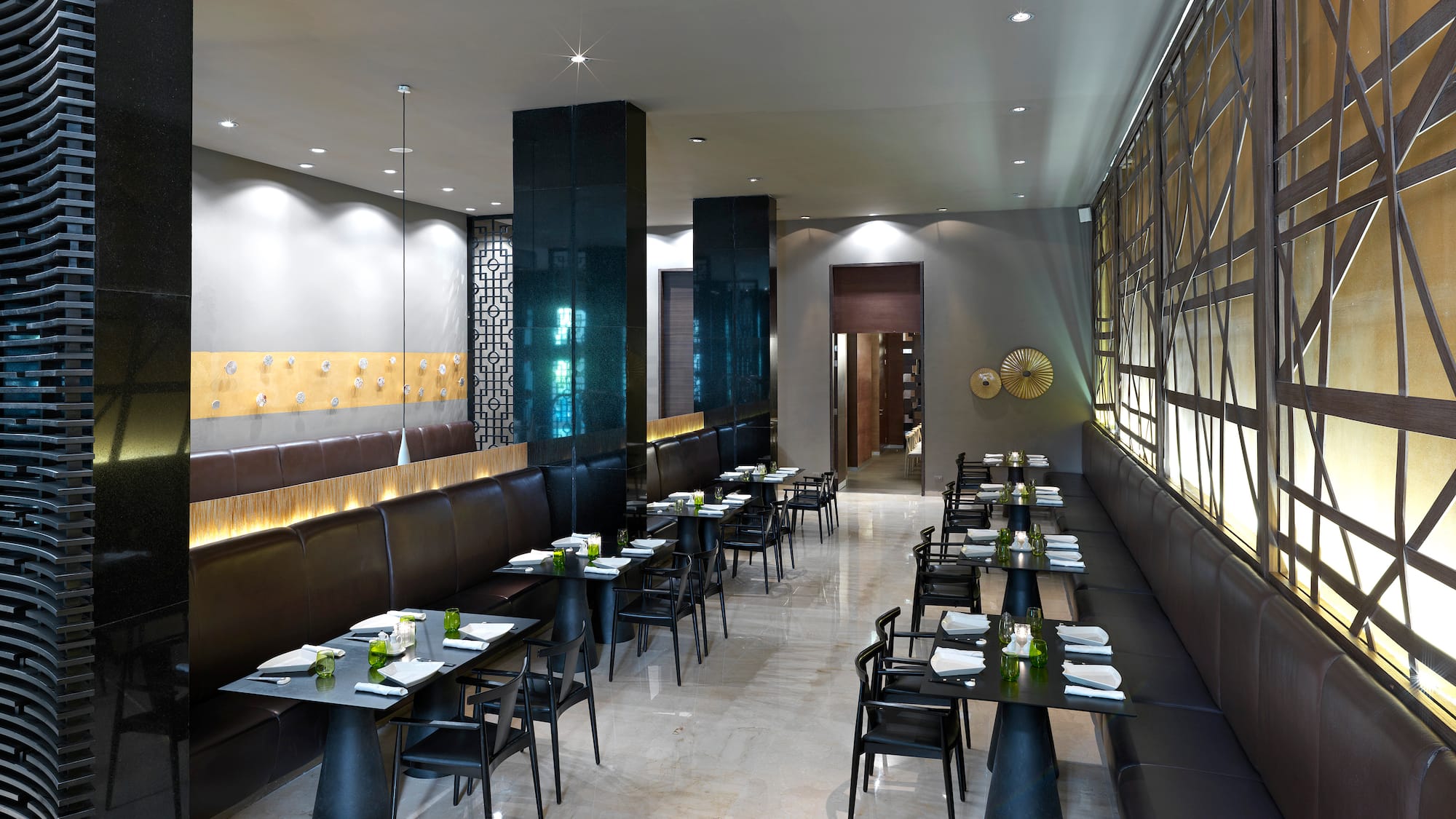 a restaurant with tables and chairs