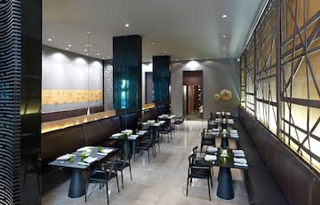 a restaurant with tables and chairs