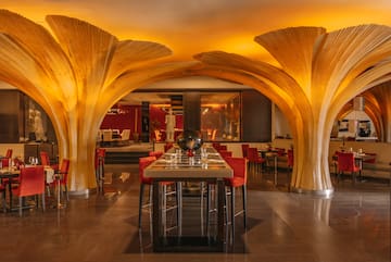 a room with a table and chairs