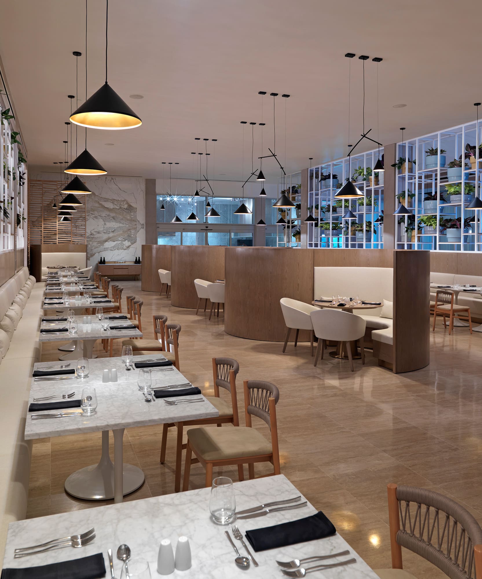 a restaurant with tables and chairs