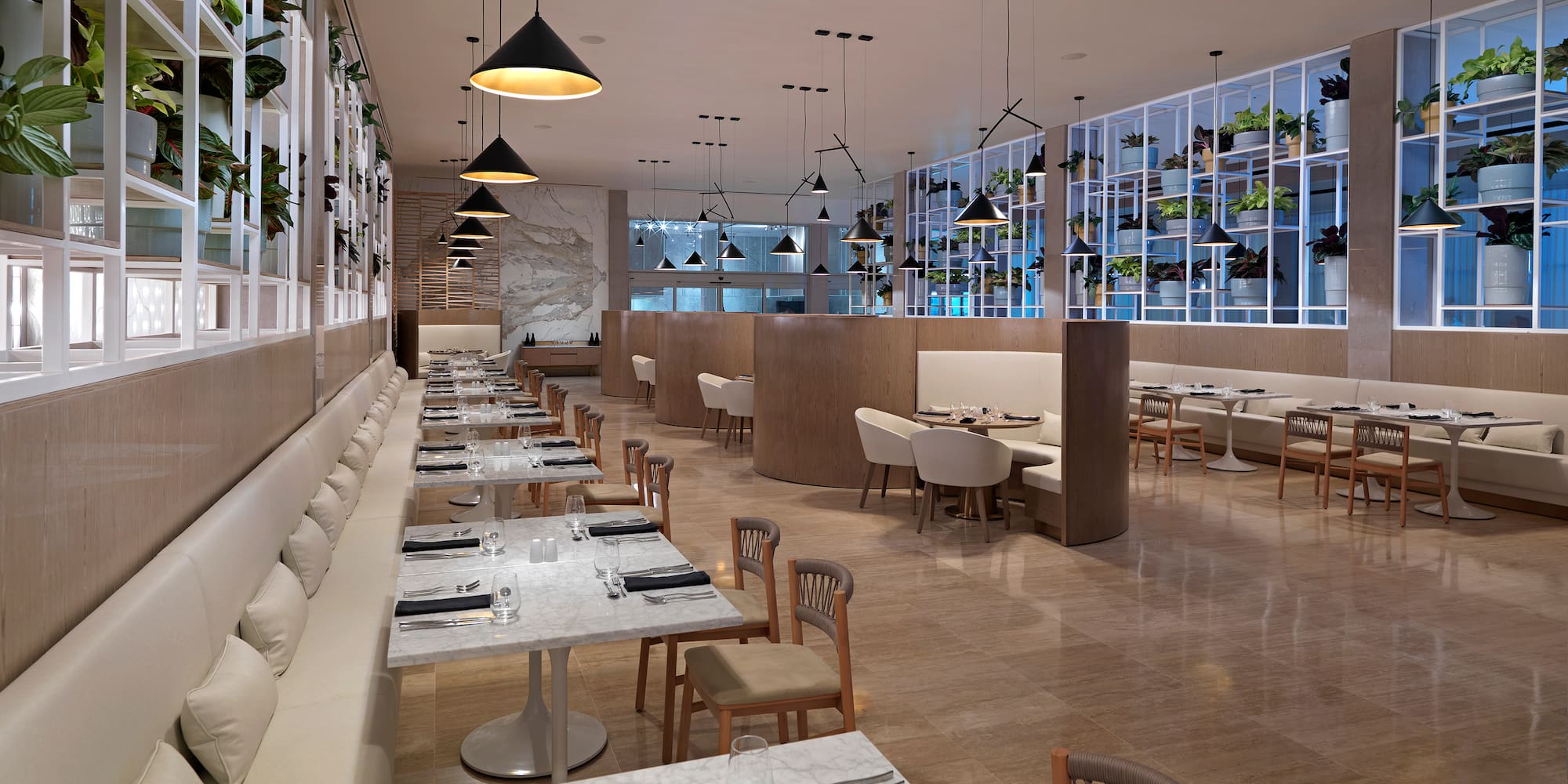 a restaurant with tables and chairs