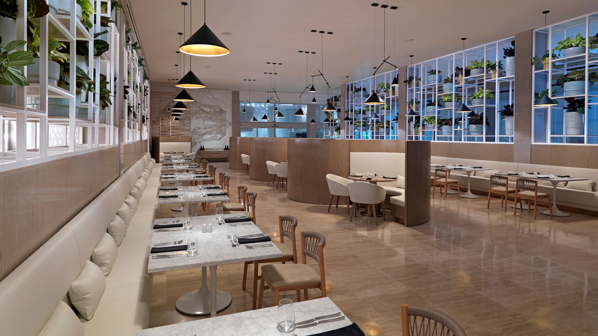 a restaurant with tables and chairs