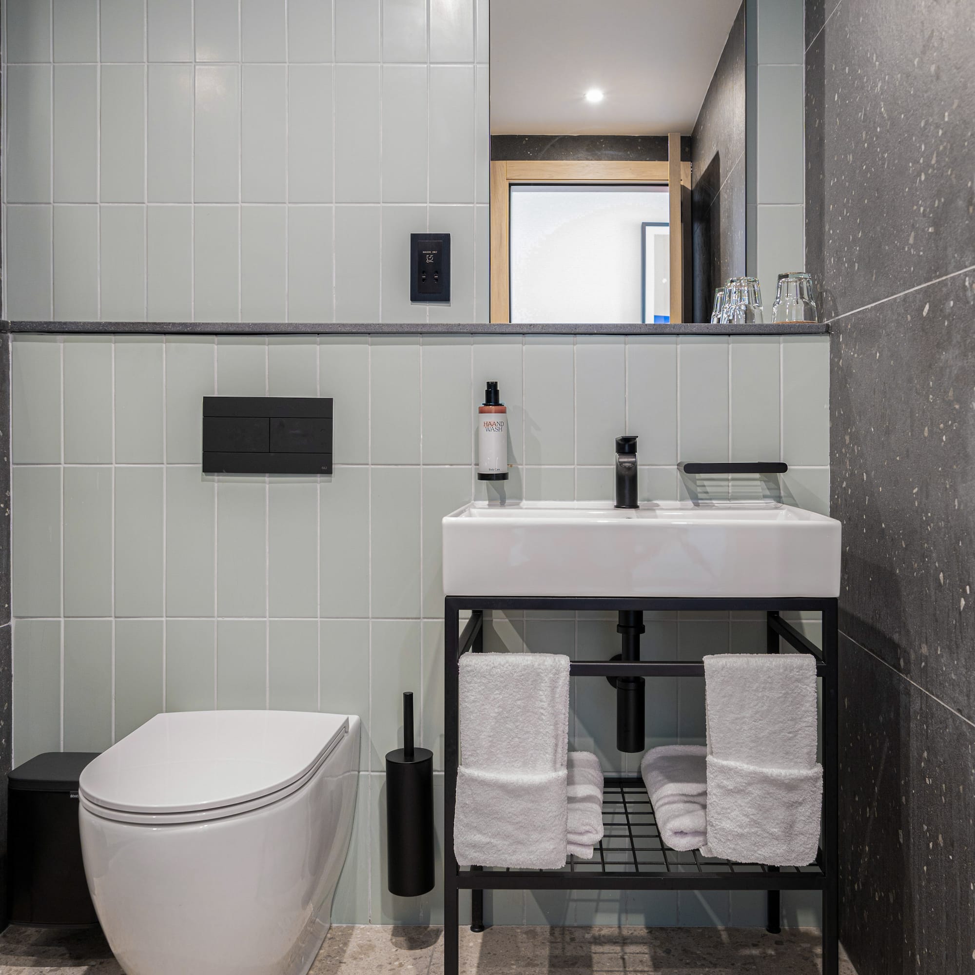 a bathroom with a sink and toilet