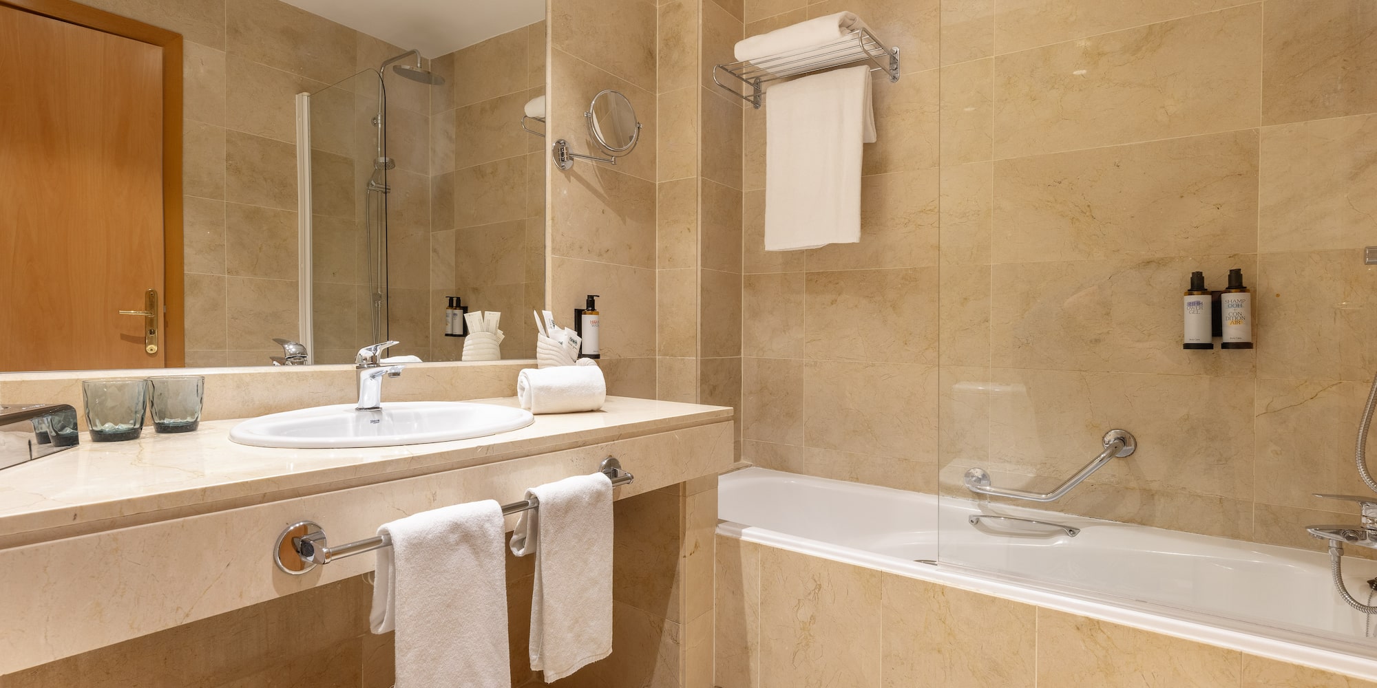 a bathroom with a shower and sink