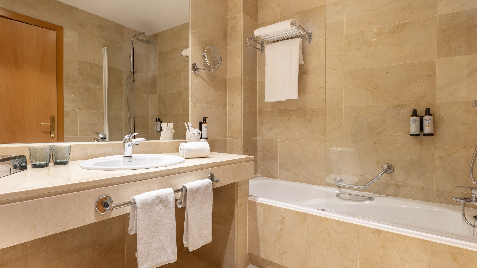 a bathroom with a shower and sink