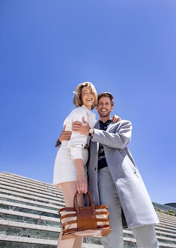 a man and woman posing for a picture