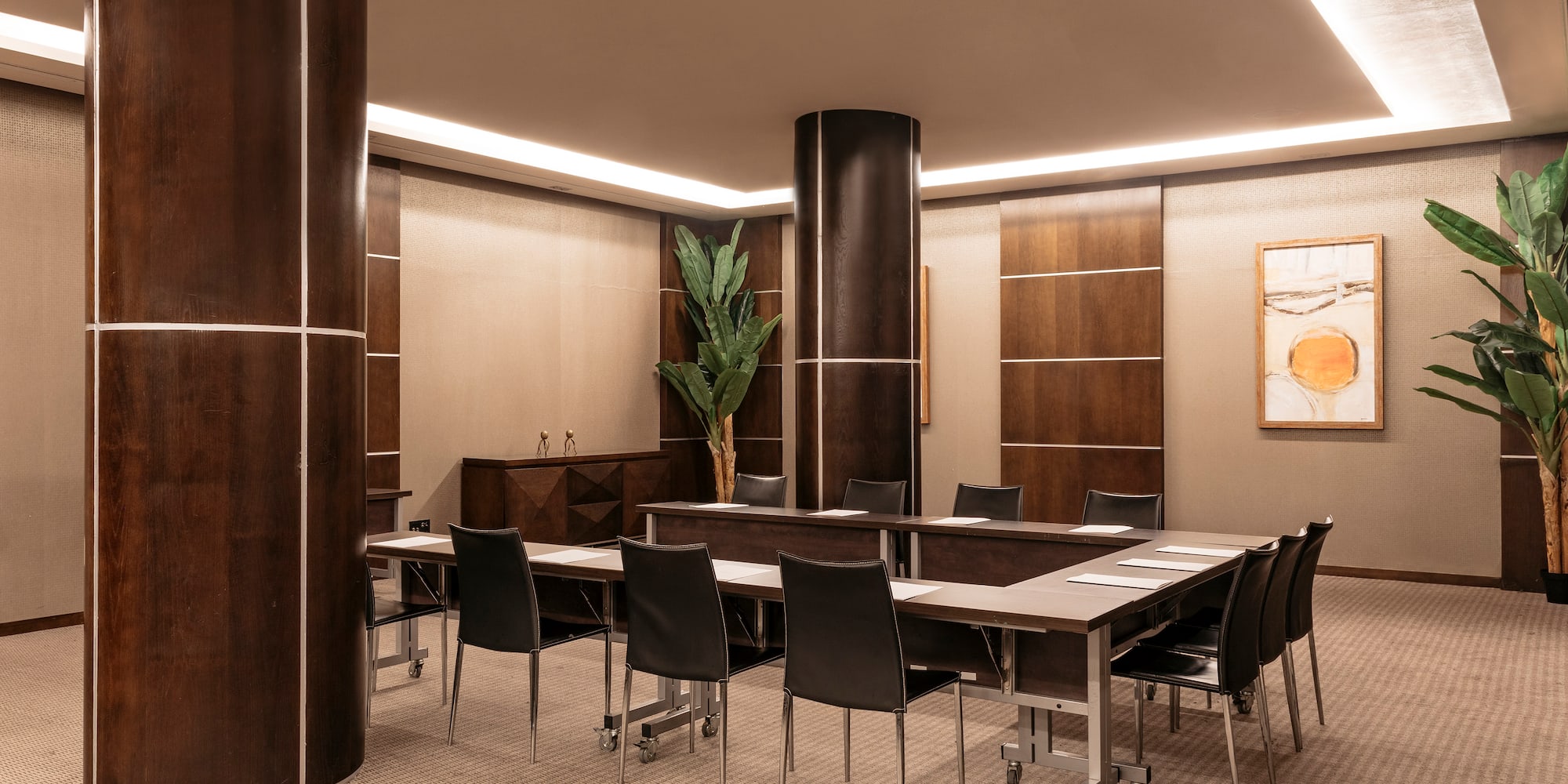 a room with a table and chairs