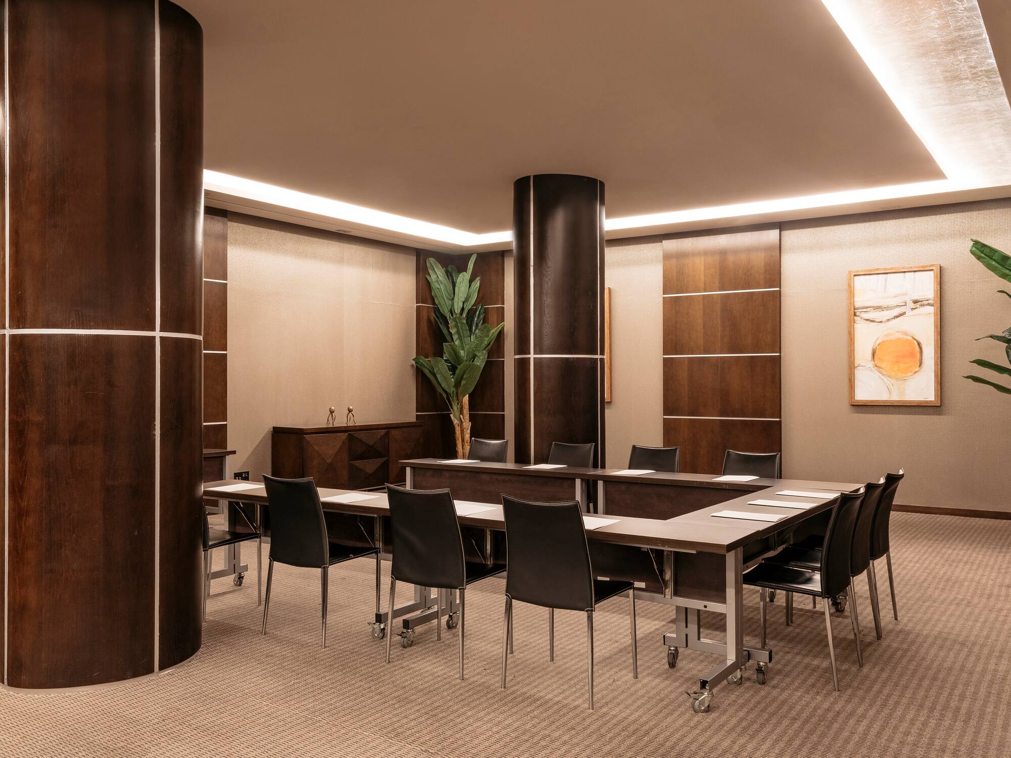 a room with a table and chairs