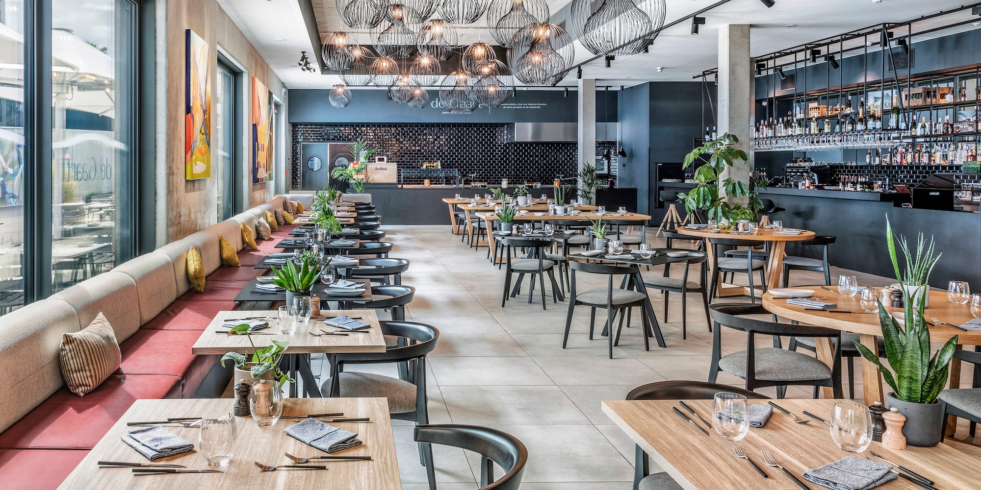 a restaurant with tables and chairs
