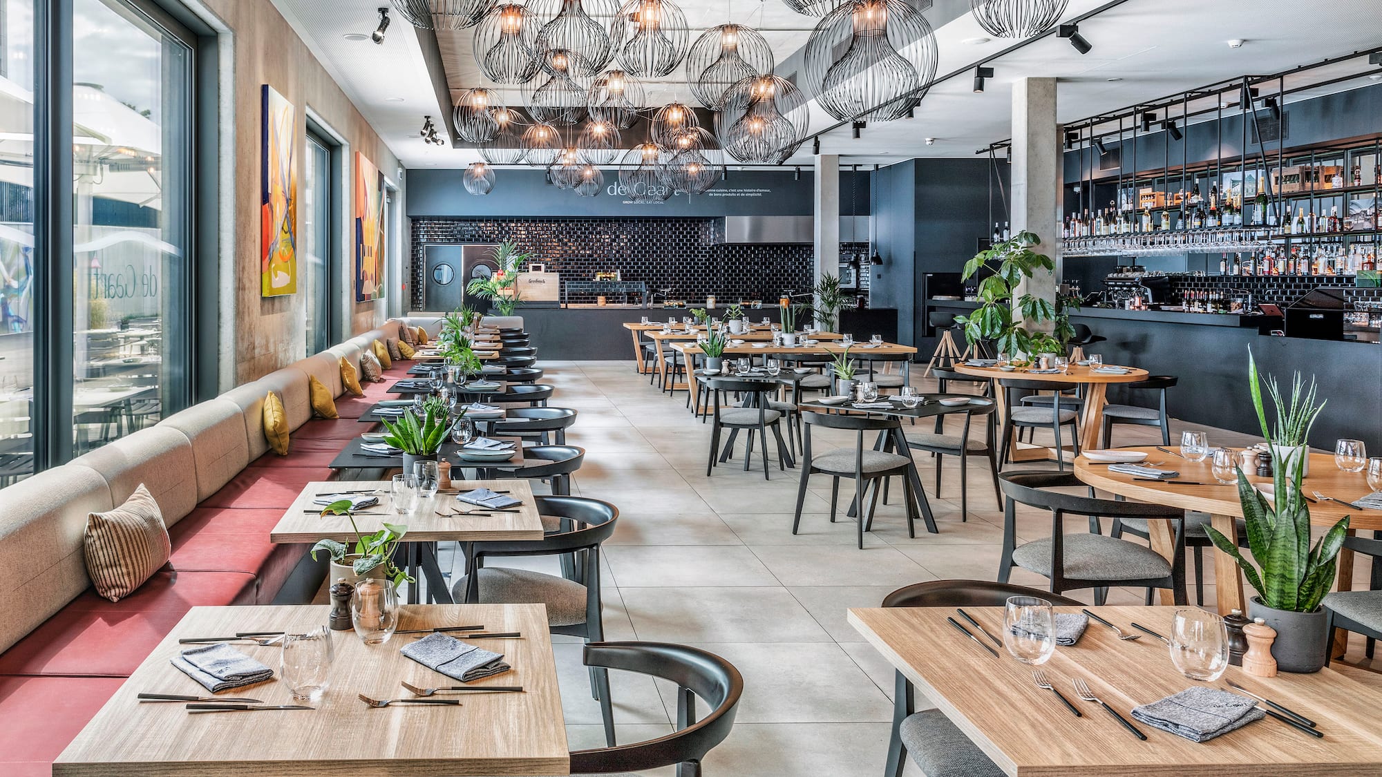 a restaurant with tables and chairs