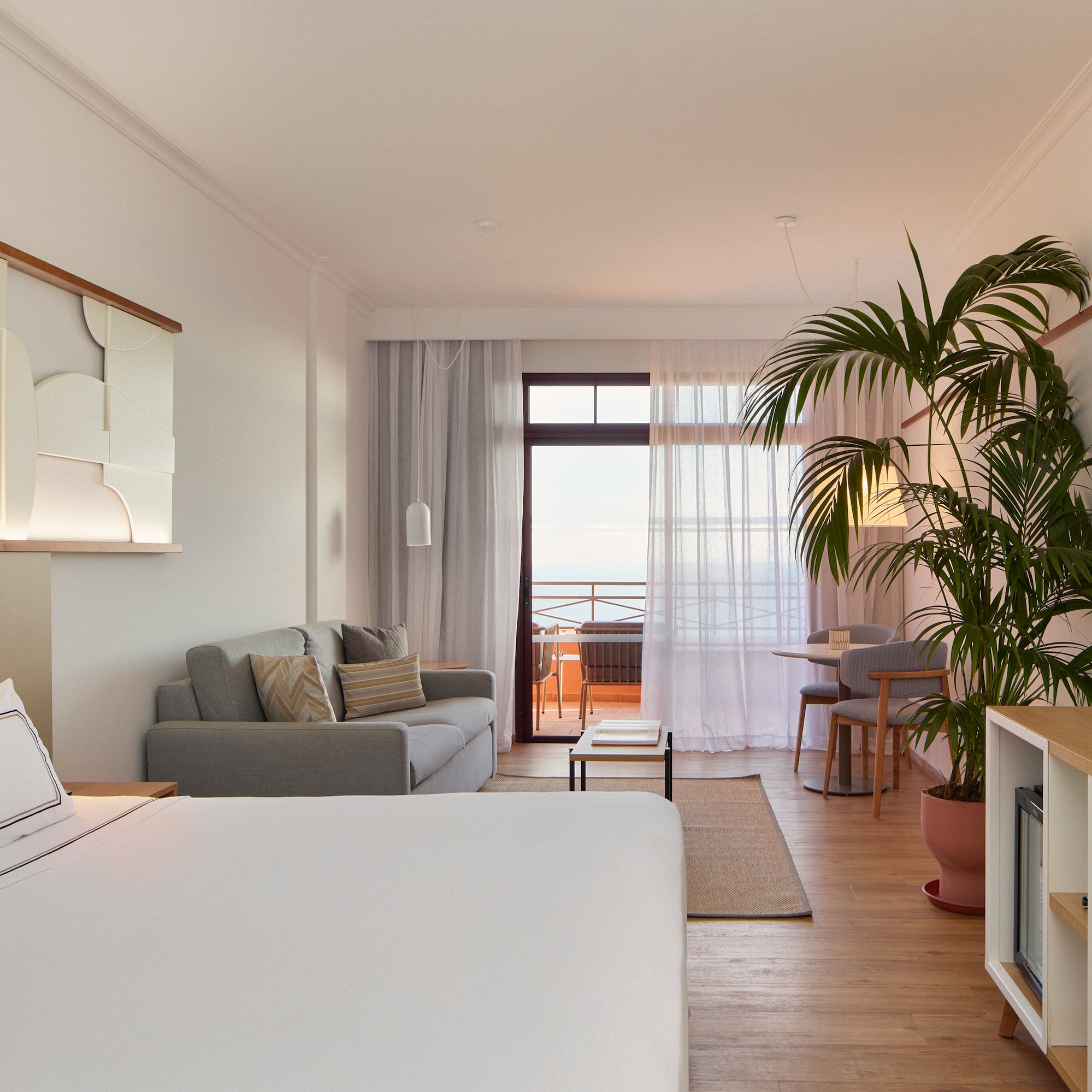 a room with a bed and a couch