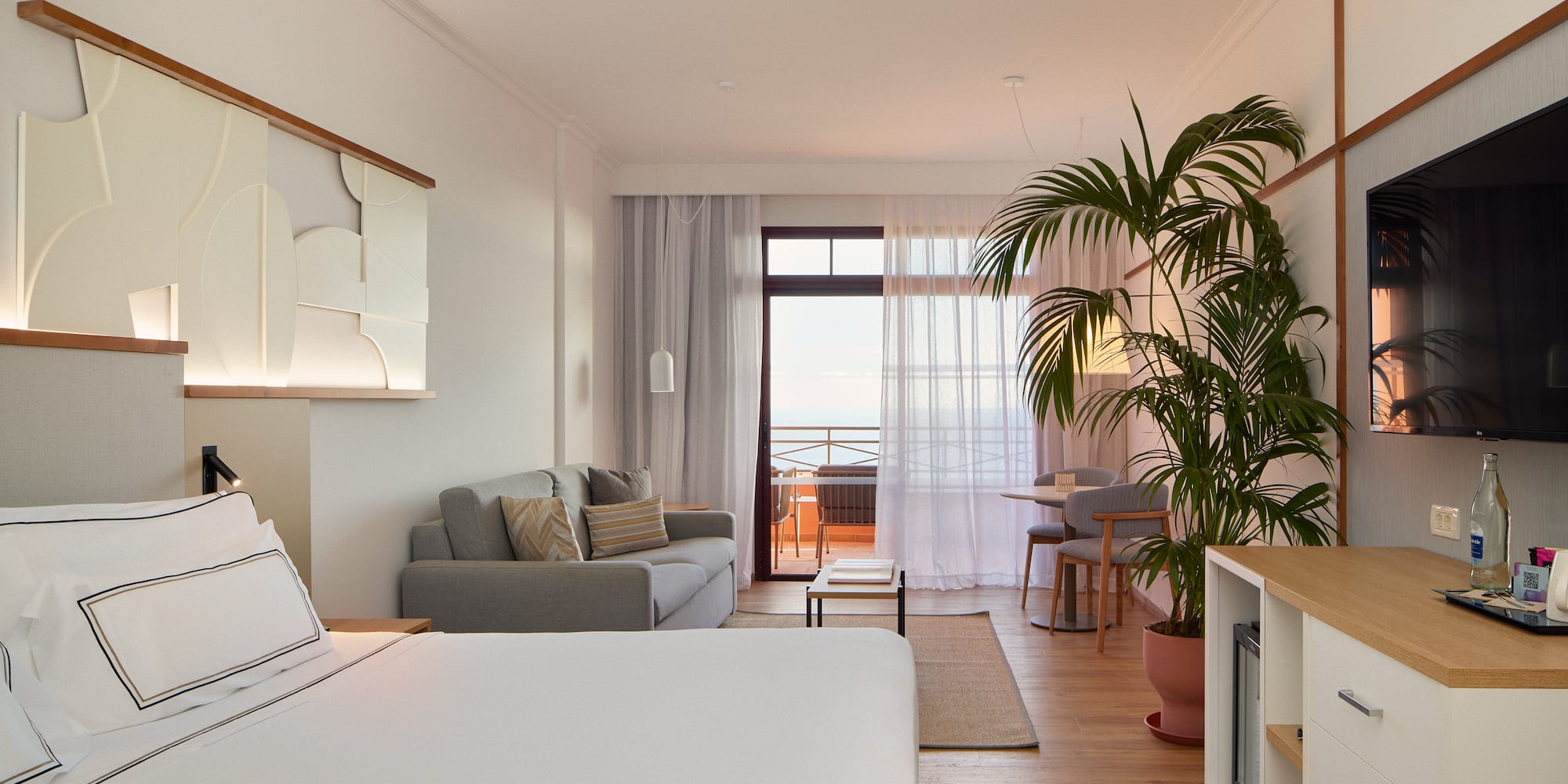 a room with a bed and a couch