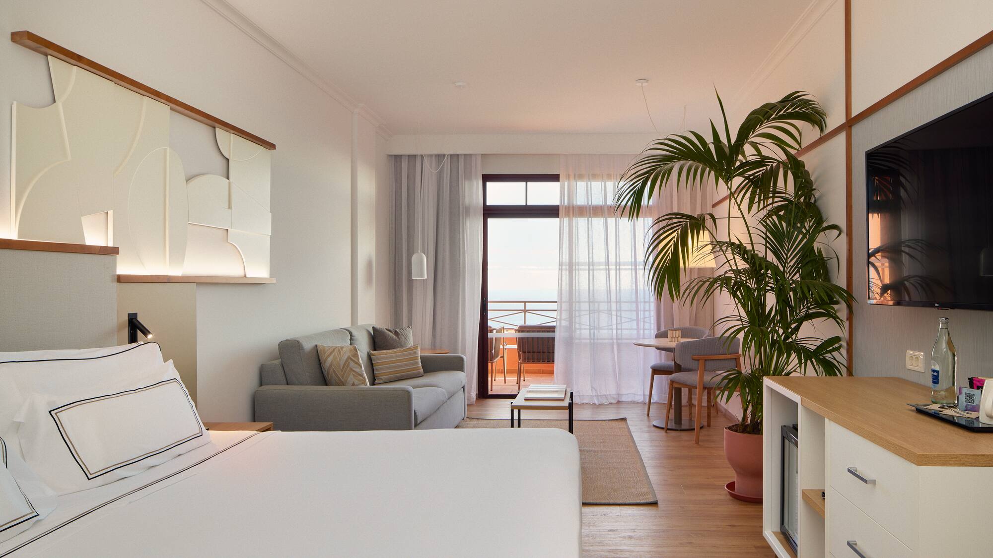 a room with a bed and a couch