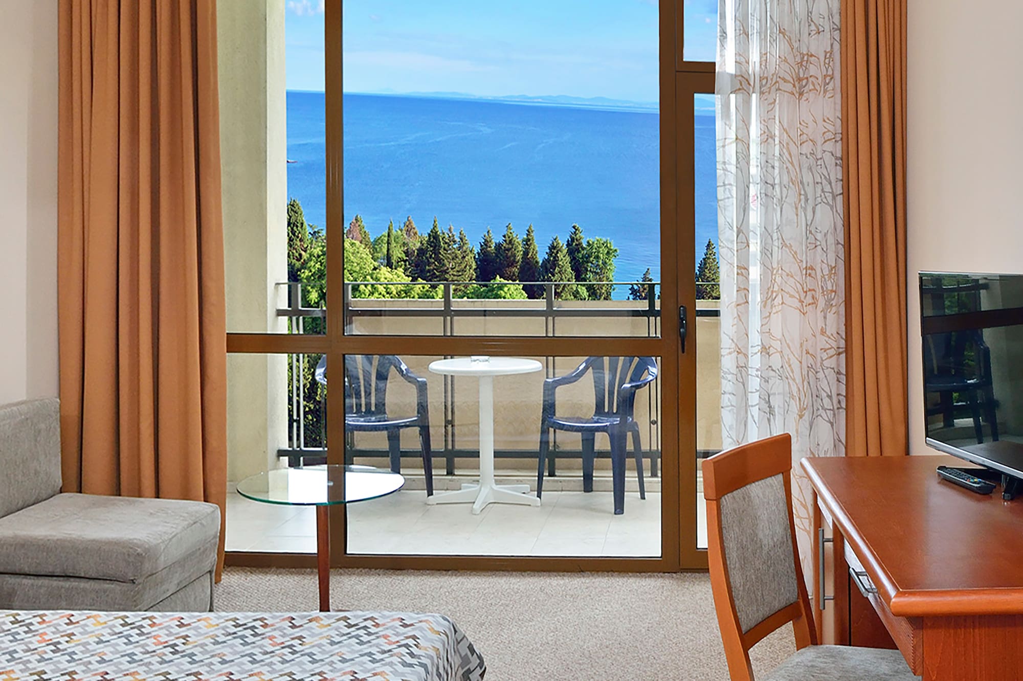 a room with a television and a table