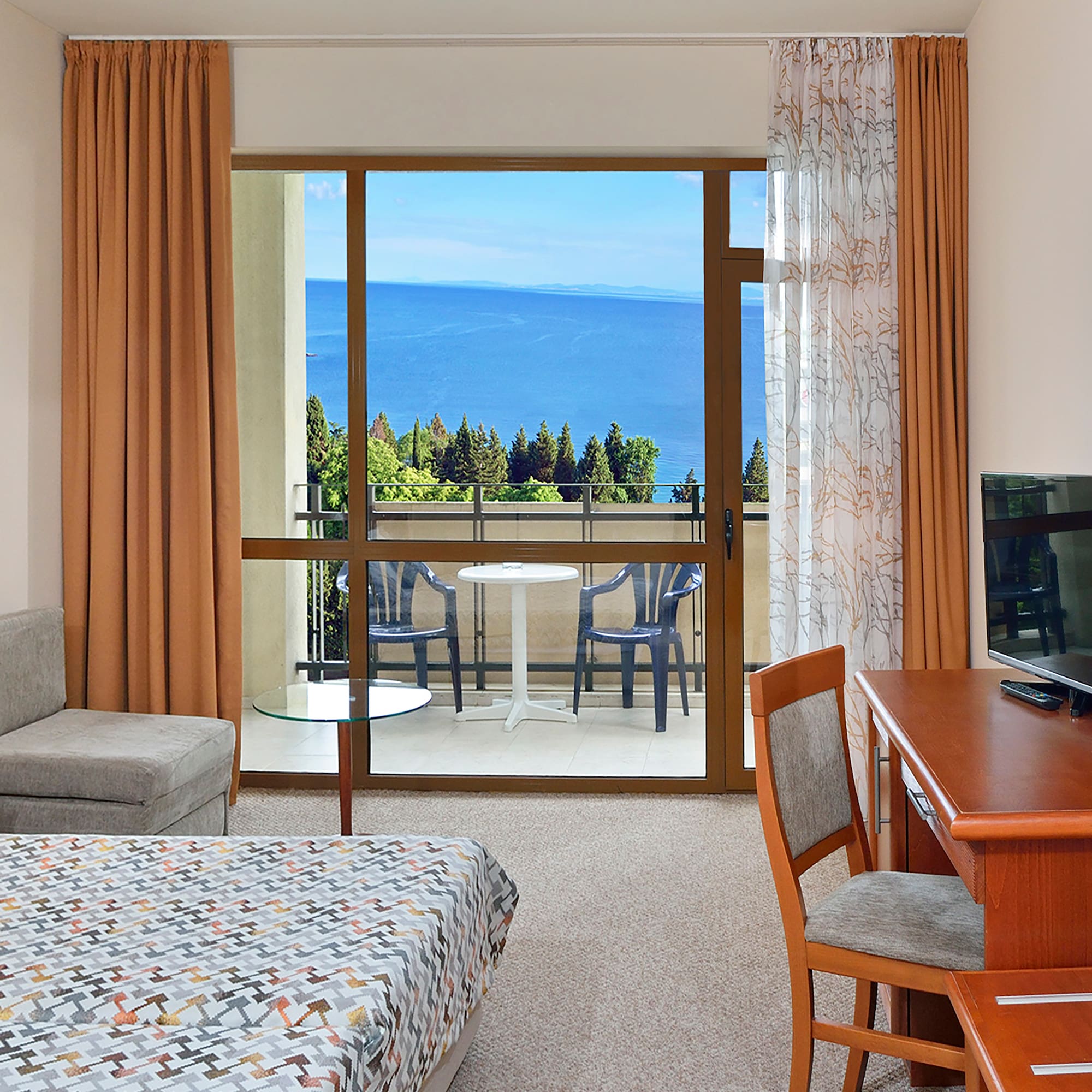 a room with a television and a table