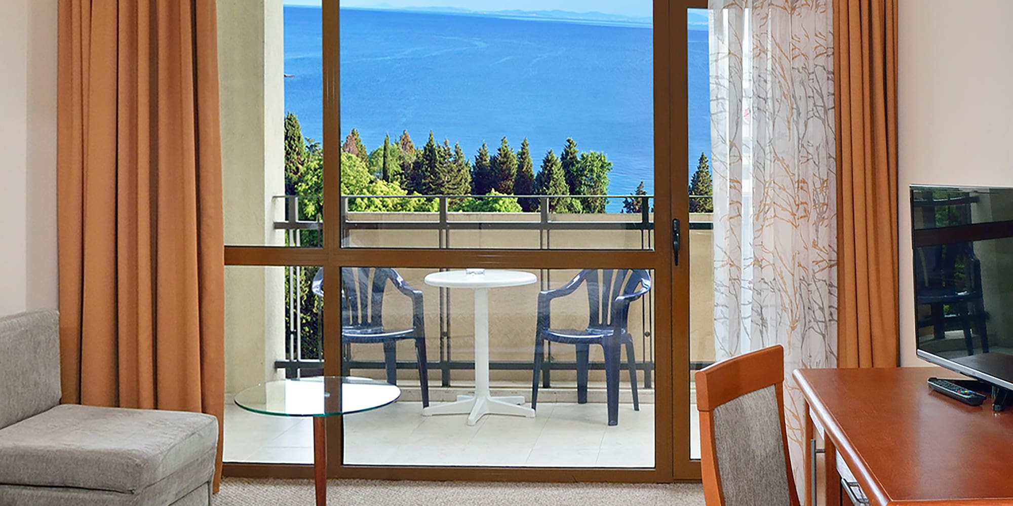 a room with a television and a table