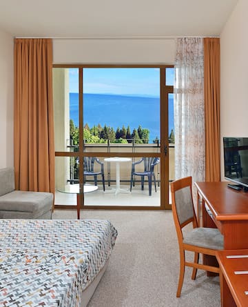 a room with a television and a table