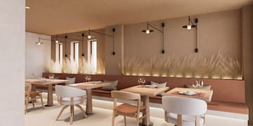 a restaurant with tables and chairs